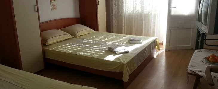 Poletne počitnice! HUDA CENA za najem apartmaja z vrtom - Kuponko.si