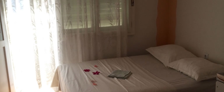 Poletne počitnice! HUDA CENA za najem apartmaja z vrtom - Kuponko.si