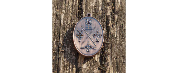 Elementarni kovanec ali amulet v darilni vrečki - Kuponko.si