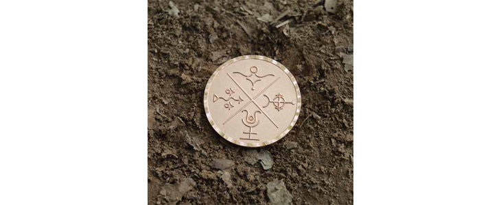Elementarni kovanec ali amulet v darilni vrečki - Kuponko.si