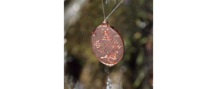 Elementarni kovanec ali amulet v darilni vrečki - Kuponko.si