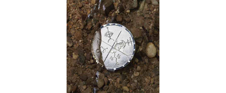 Elementarni kovanec ali amulet v darilni vrečki - Kuponko.si