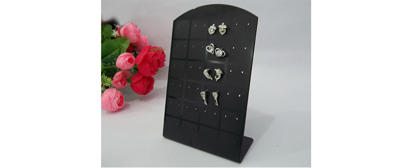 Plastično stojalo za 24 uhanov - Kuponko.si